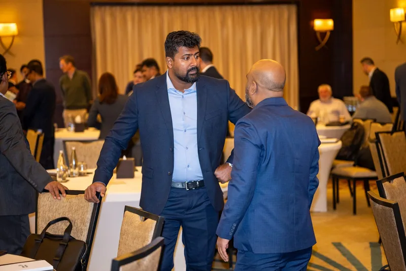 Attendees talking between sessions at the channel partner meeting