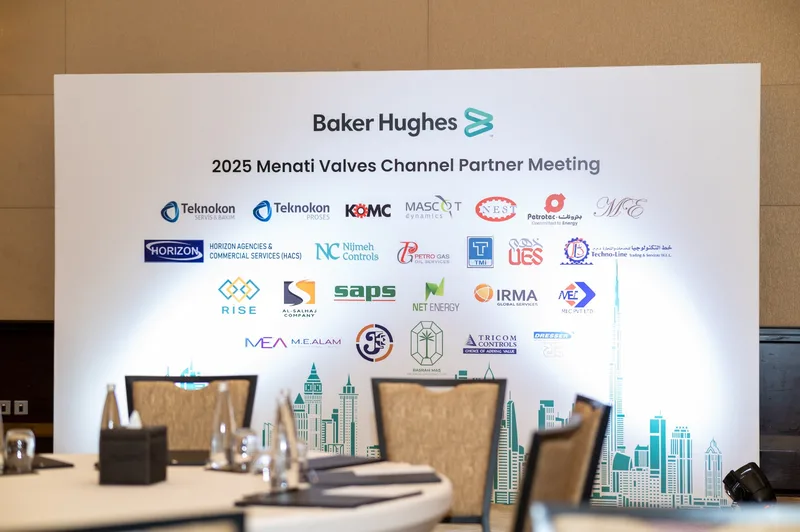 Backdrop of the Baker Hughes 2025 MENATI Valves Channel Partner Meeting showing partner logos, including TMI