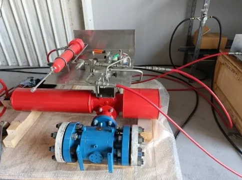 Emergency shutdown valve with red actuator and control panel during FAT